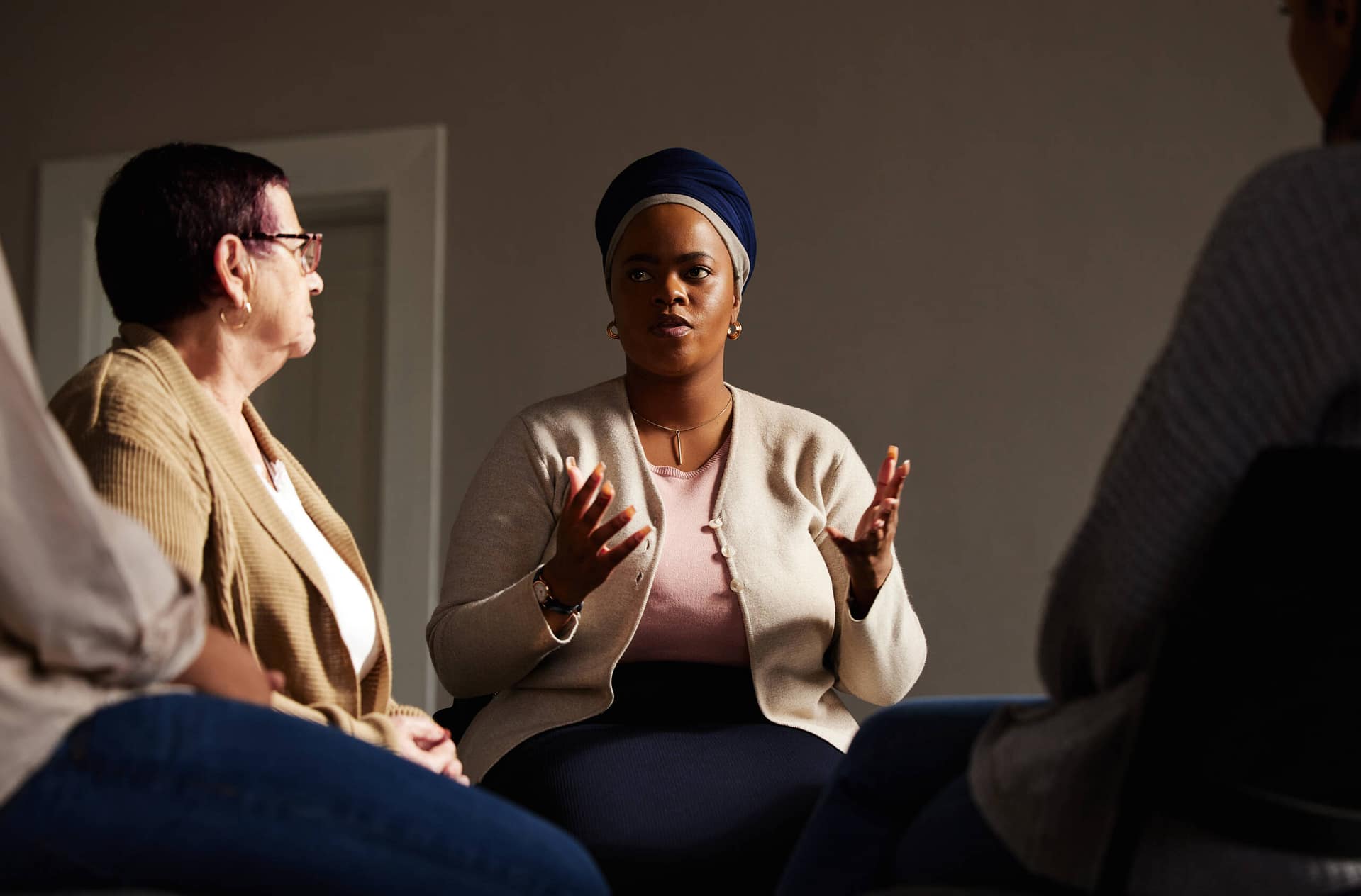support-black-woman-and-senior-group-therapy-with-2025-04-06-11-41-28-utc Support, black woman and senior group therapy with understanding, feelings and talking in session. .