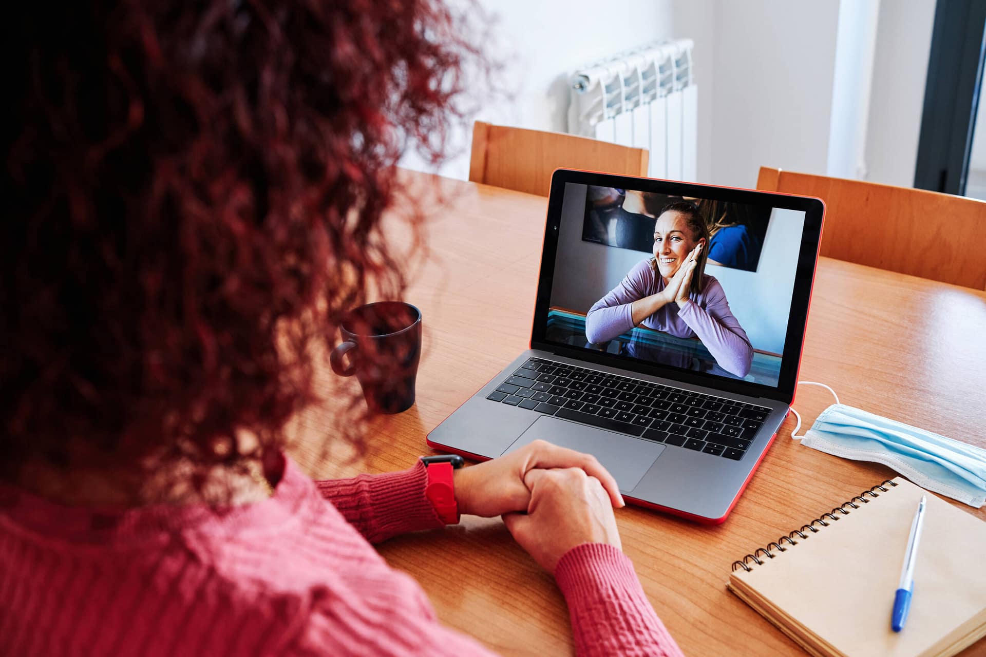 woman at home doing a videoconference – stay home concept woman at home doing a videoconference - stay home concept